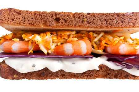 close up sandwich - shrimp, carrots, red cabbage and cream sauceの写真素材