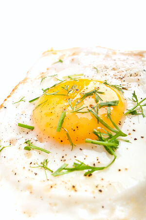 closeup of a fried eggの写真素材