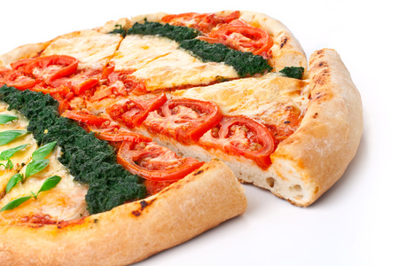 sliced vegetable cheese spinach and tomatoes pizzaの写真素材