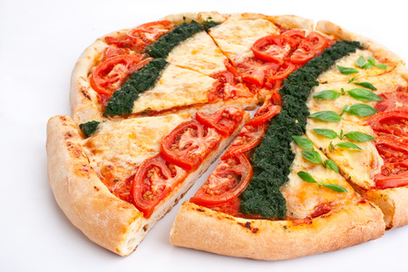 sliced vegetable cheese spinach and tomatoes pizzaの写真素材