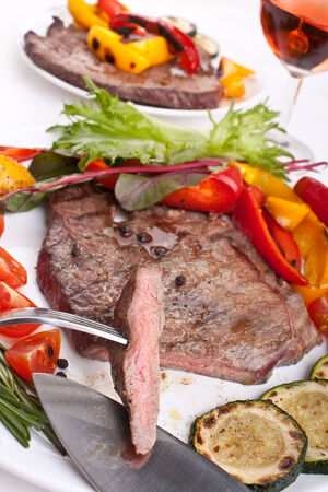tender beef fillet steak with vegetablesの写真素材