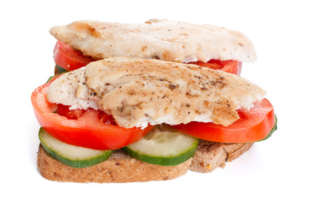 chicken, tomatoes, cucumbers whole wheat sandwichの写真素材