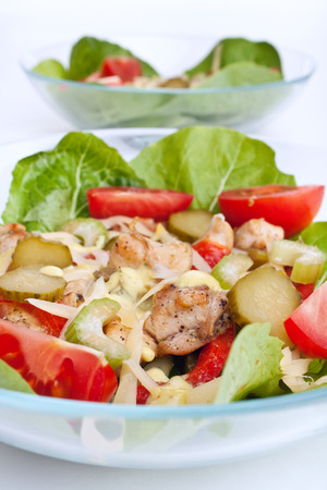 two servings of healthy light chicken breast saladの写真素材