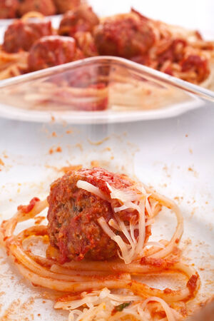 meatballs with spaghetti, tomato sauce and grated cheeseの写真素材
