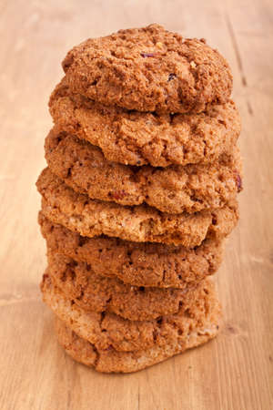 big pile of cookies on wooden tableの写真素材