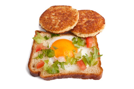 round french toasts and eggie bread on white backgroundの写真素材