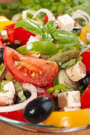 close up healthy greek salad with ingredientsの写真素材
