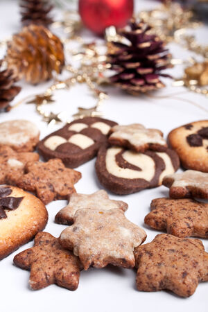 big pile of various cookies with pinecones and christmas toysの写真素材