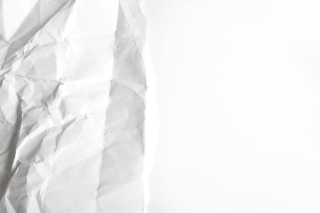 Crumpled white paper isolated on white background with copy space.