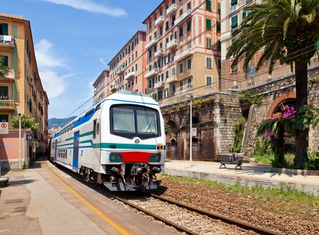 Two-storeyed train at railway station in ?amogli. Italy, Liguria.の写真素材