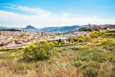 View of the city of Antequera, the ancient fortress of Alcazaba and the mountain of loversの写真素材
