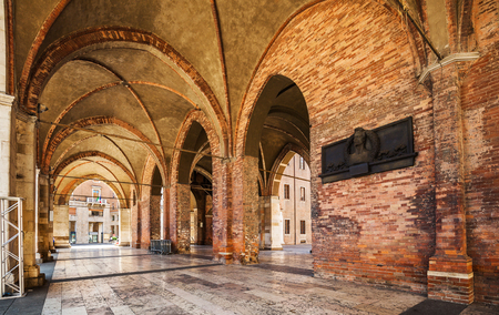 Arcades of the main facade of the Gothic palace (Palazzo Comunale) in the center of Piacenzaのeditorial素材