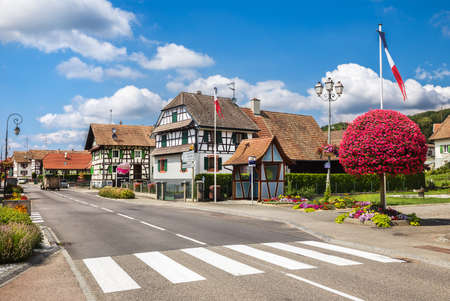 Waldighoffen, France - July 15, 2019: Colorful ornamented facades in medieval town Waldighoffen, Alsace, France, Europeのeditorial素材