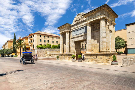 Cordoba, Spain - June 19, 2018: Puerta del Puente or Bridge Gate, a triumphal renaissance arch in Cordoba, Andalusia, Spain.のeditorial素材