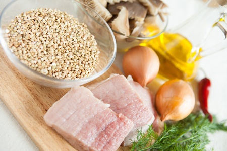 Raw meat, onions, mushrooms - ingredients for garnish, close upの写真素材