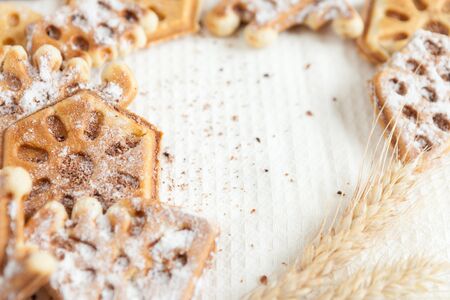homemade waffles shaped and ears of wheat, closeupの写真素材