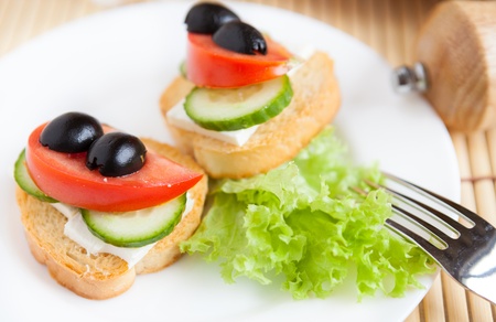 snack of crackers and cheese and fresh vegetables, closeupの写真素材