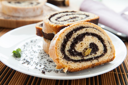 pieces of poppy seed cake on a plate, closeupの写真素材