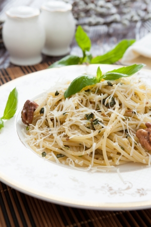 spaghetti with pesto and crushed nuts, closeupの写真素材