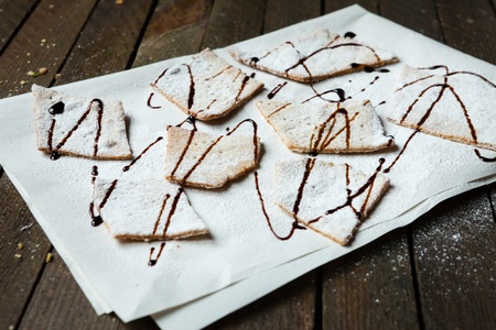 crispy cookies with chocolate sauce, close up