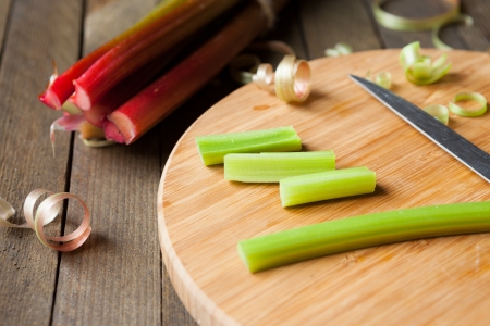 raw rhubarb on a cutting board, close up foodの写真素材