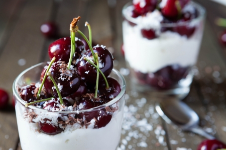 dessert with cherries and whipped cream, food close upの写真素材