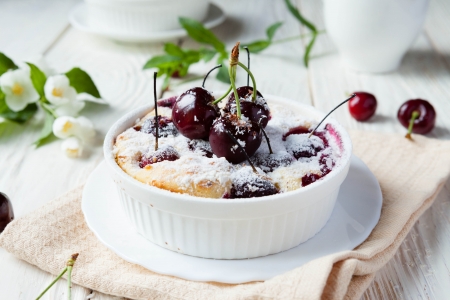 Cherry Clafoutis with powdered sugar, food close upの写真素材