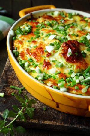 casserole with cheese on a rural kitchen, foodの写真素材