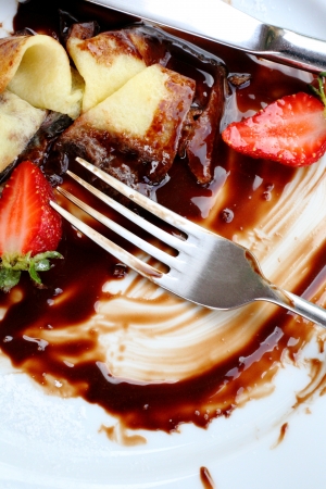 pancakes with chocolate sauce and strawberries, close upの写真素材