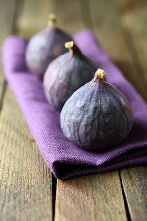 whole fresh figs on a napkin, food close up
