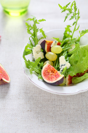 delicious salad with figs and blue cheese, foodの写真素材