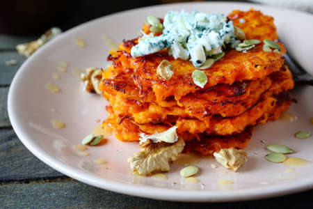 Pumpkin pancakes with honey and blue cheese, food close upの写真素材