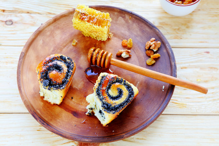 rolls with poppy seeds and honey, food closeupの写真素材