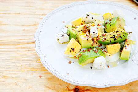 light salad with avocado and feta, food closeupの写真素材