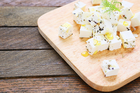 feta slices on cutting board, food closeupの写真素材