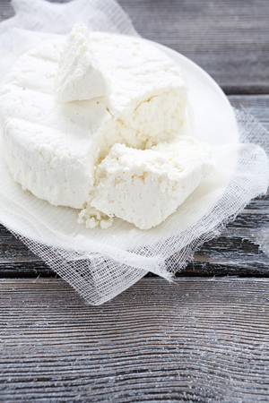 cottage cheese on white gauze food closeupの写真素材