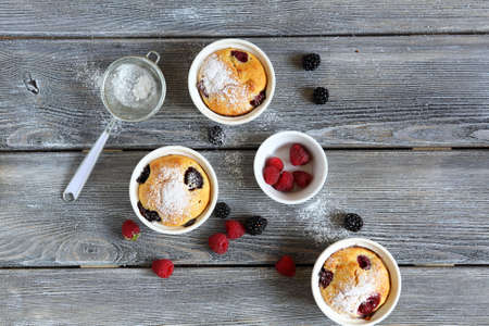 cupcakes with summer berries, top view, food closeupの写真素材