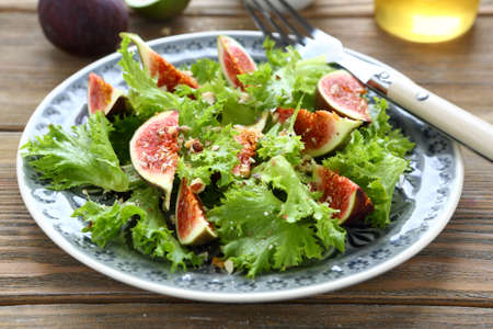 Fresh salad with figs and lettuce, healthy foodの写真素材