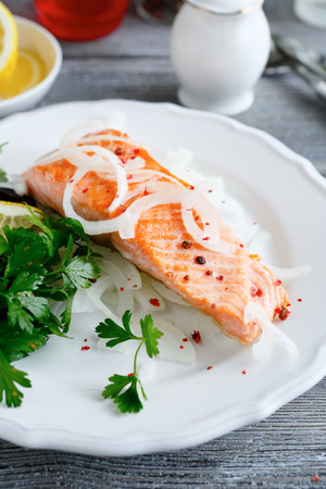 Salmon Fillet with lemon and parsley, food close upの写真素材