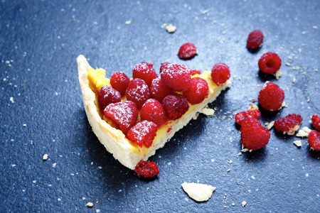 Sweet dessert, a slice of cake with raspberries,  delicious foodの写真素材