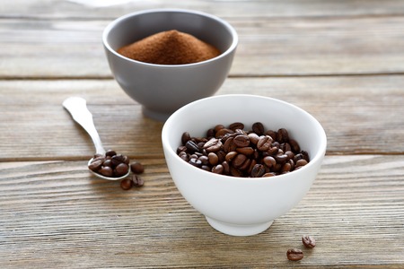 Whole grains of black coffee, closeupの写真素材