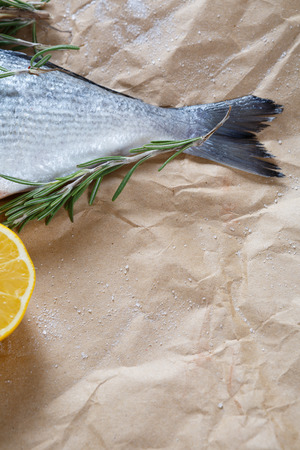 Fish tail with rosemary and lemon, foodの写真素材