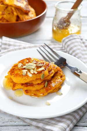 Sweet pumpkin pancakes on a plate, foodの写真素材