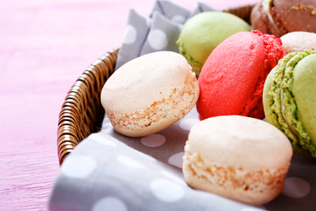 Macaroon in a wicker basket, foodの写真素材