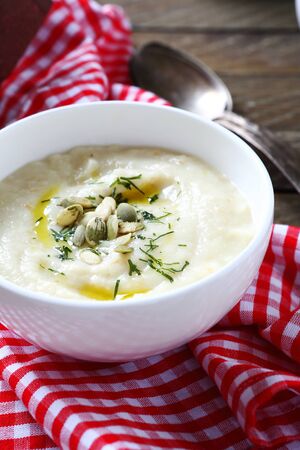 Cream soup in a white bowl, foodの写真素材