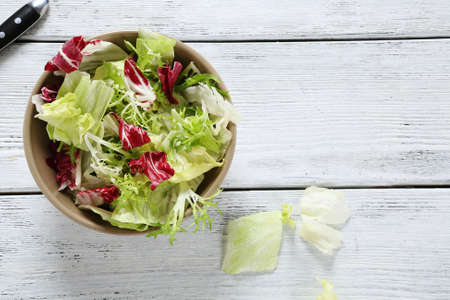 fresh and crisp salad in a bowl, foodの写真素材