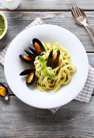 Nutritional pasta with mussels, top viewの写真素材