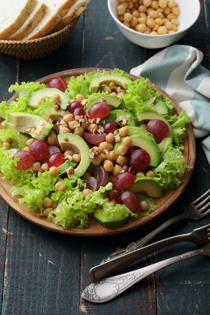 fresh and green salad on plateの写真素材