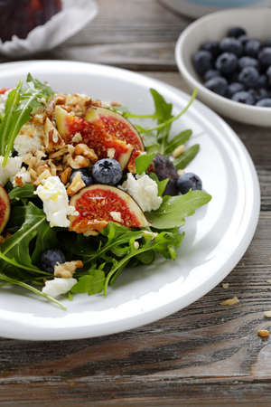 fresh salad with figs and cheeseの写真素材