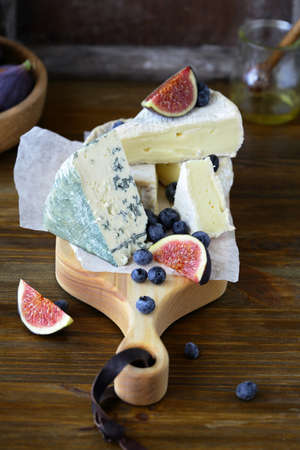 cheese mix on cutting boardsの写真素材